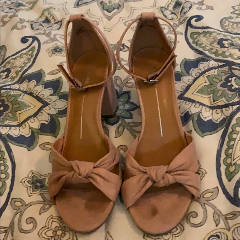 Report brand heels